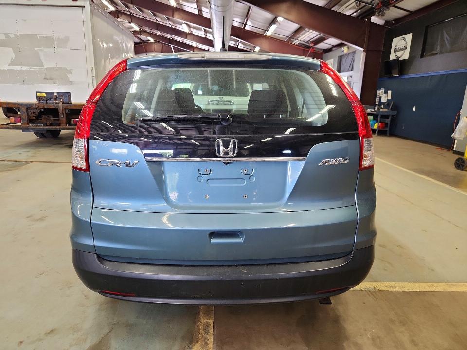 Photo 6 from auction – 2013 HONDA CR-V with VIN 5J6RM4H30DL031927
