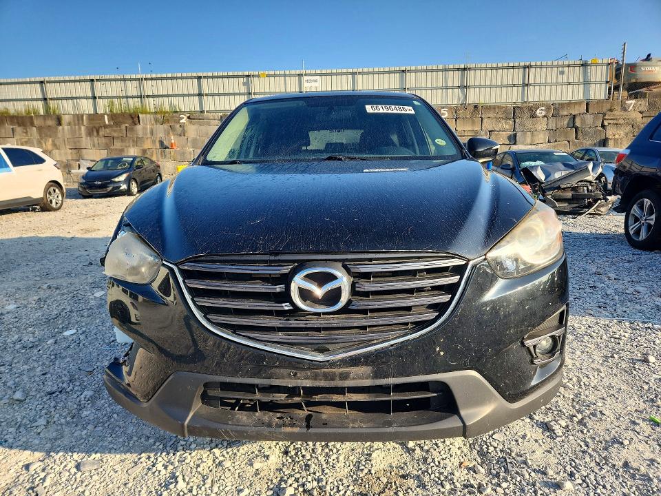 Photo 5 from auction – 2016 MAZDA CX-5 with VIN JM3KE2CY8G0653314