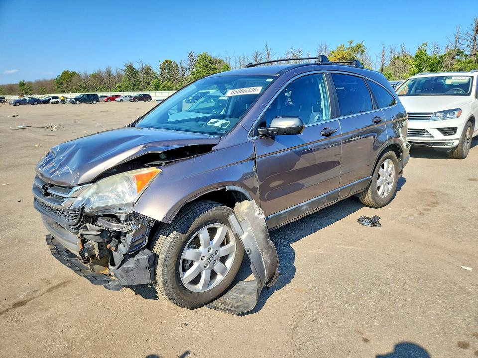 HONDA CR-V 2011 with VIN 5J6RE4H48BL093899 - Photo from auction