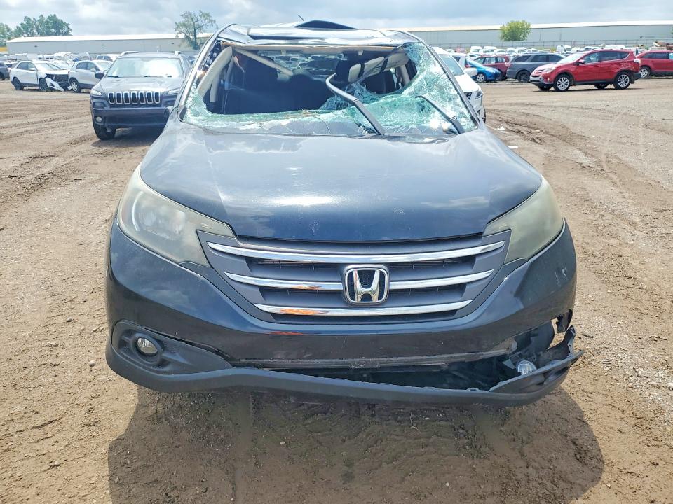 Photo 5 from auction – 2014 HONDA CR-V with VIN 5J6RM4H54EL074900