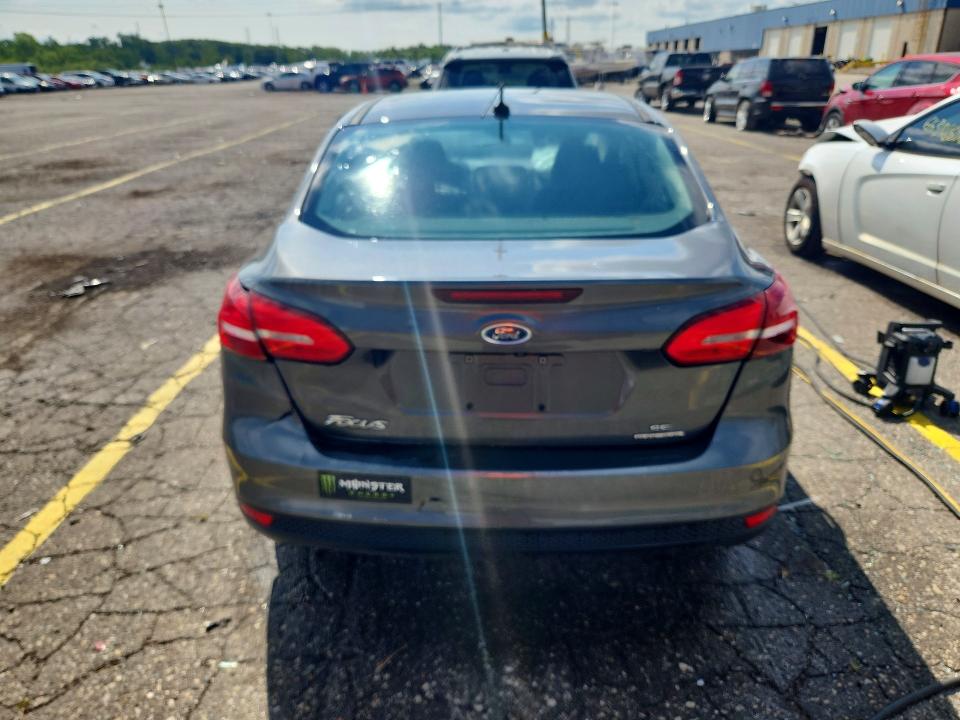Photo 6 from auction – 2016 FORD FOCUS with VIN 1FADP3F24GL359437