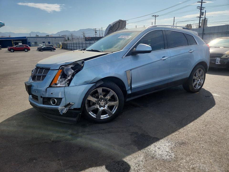 CADILLAC SRX 2011 with VIN 3GYFNBEY5BS659588 - Photo from auction