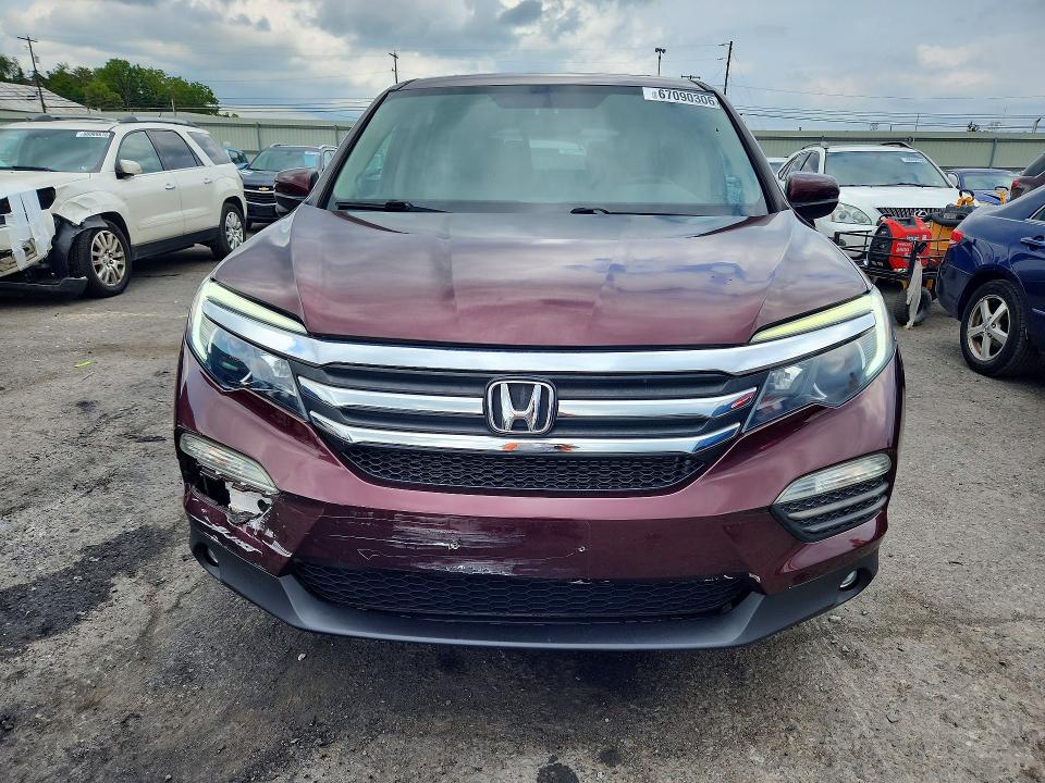 Photo 5 from auction – 2016 HONDA PILOT with VIN 5FNYF6H83GB009639