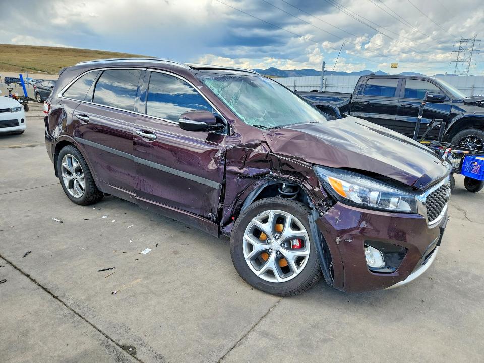 Photo 4 from auction – 2016 KIA SORENTO with VIN 5XYPKDA52GG002296