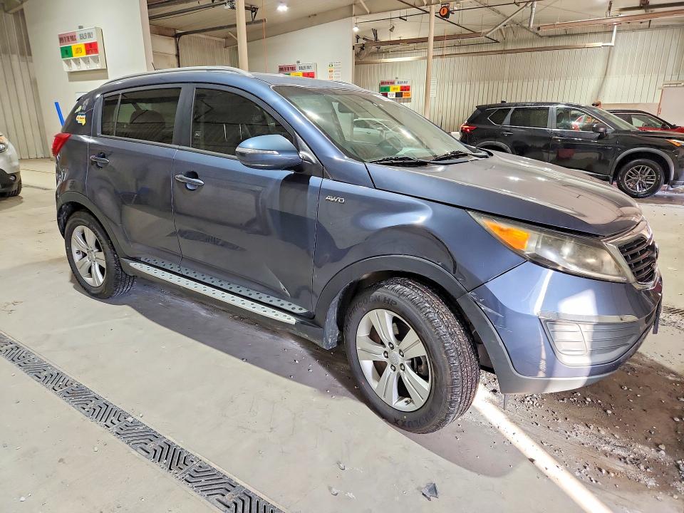 Photo 4 from auction – 2013 KIA SPORTAGE with VIN KNDPBCA25D7367077