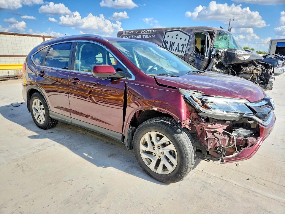 Photo 4 from auction – 2015 HONDA CR-V with VIN 2HKRM3H79FH509806