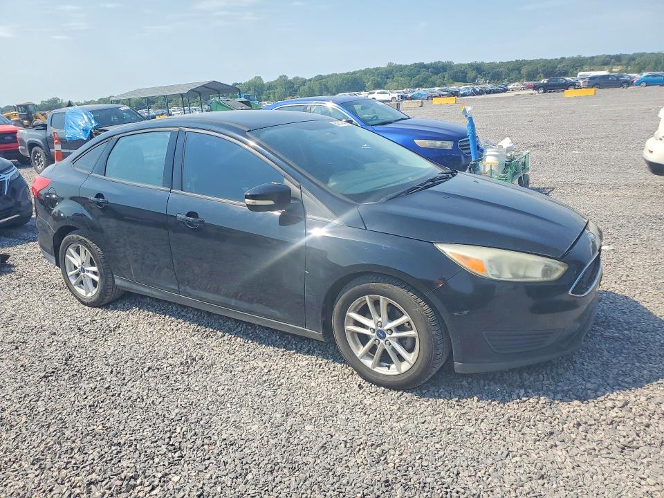 Photo 4 from auction – 2016 FORD FOCUS with VIN 1FADP3F20GL323874