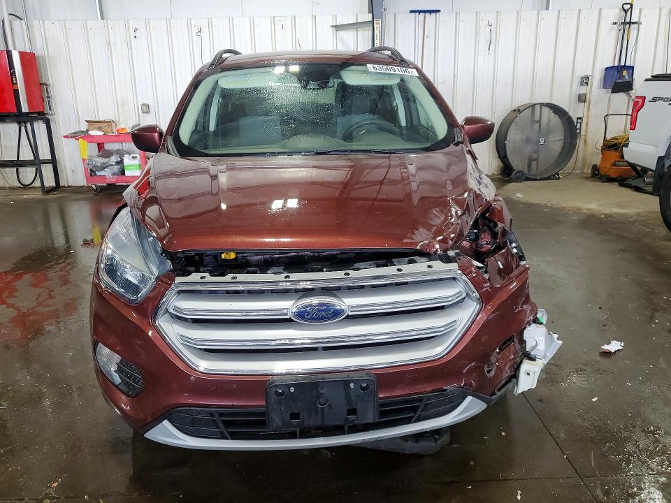 Photo 5 from auction – 2018 FORD ESCAPE with VIN 1FMCU9GD1JUC48665