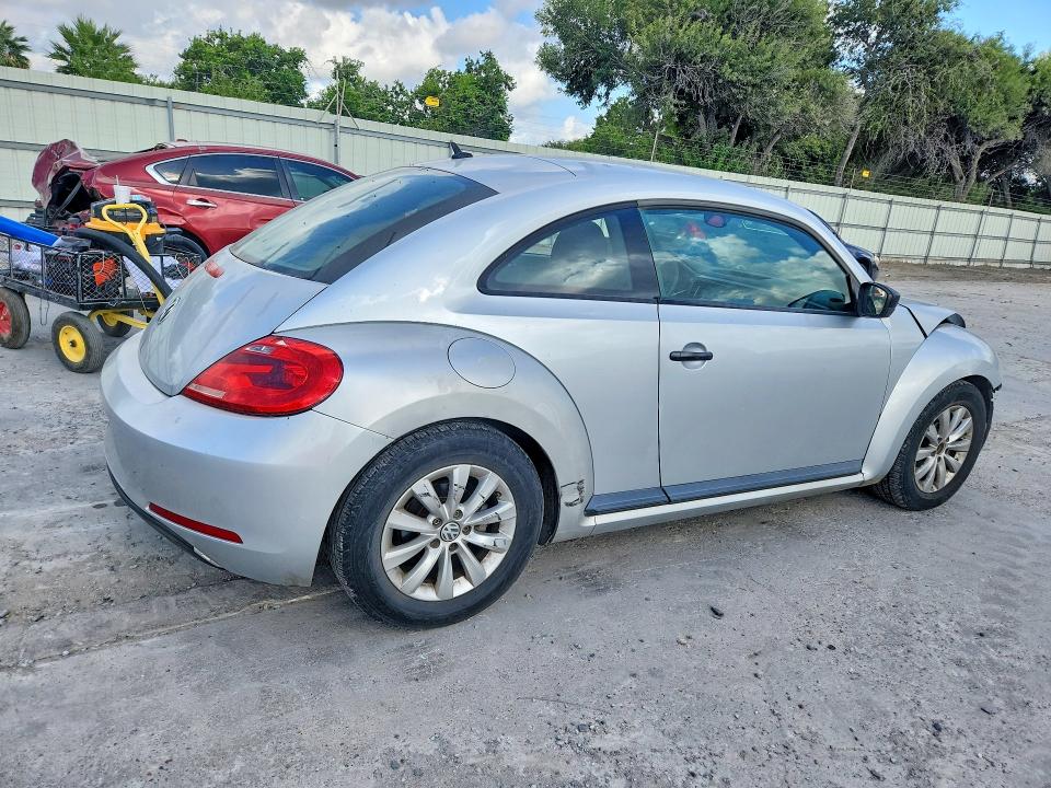 Photo 3 from auction – 2013 VOLKSWAGEN BEETLE with VIN 3VWFP7AT9DM660867