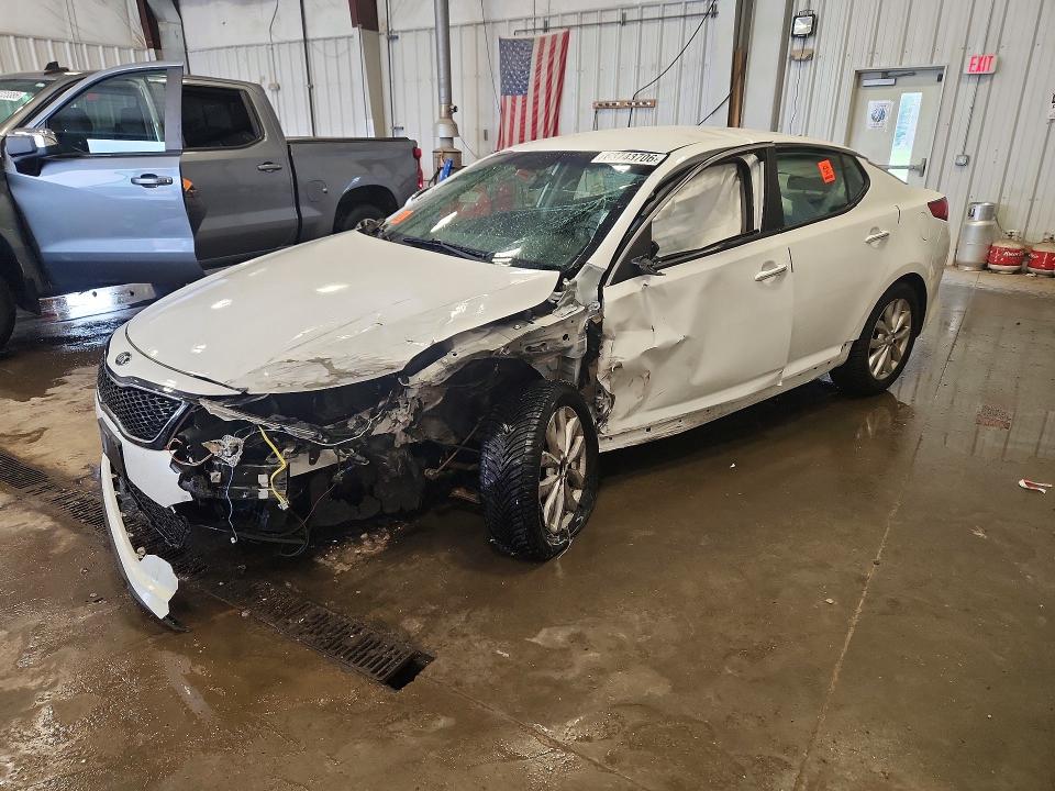 KIA OPTIMA 2014 with VIN 5XXGM4A70EG315375 - Photo from auction
