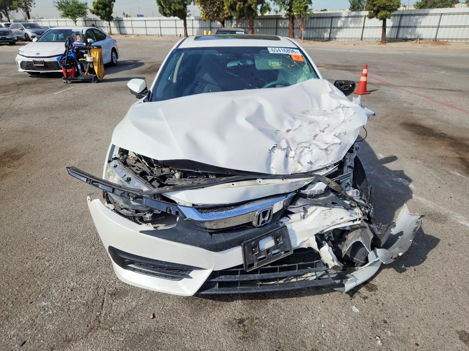 Photo 5 from auction – 2018 HONDA CIVIC with VIN 2HGFC2F77JH513861