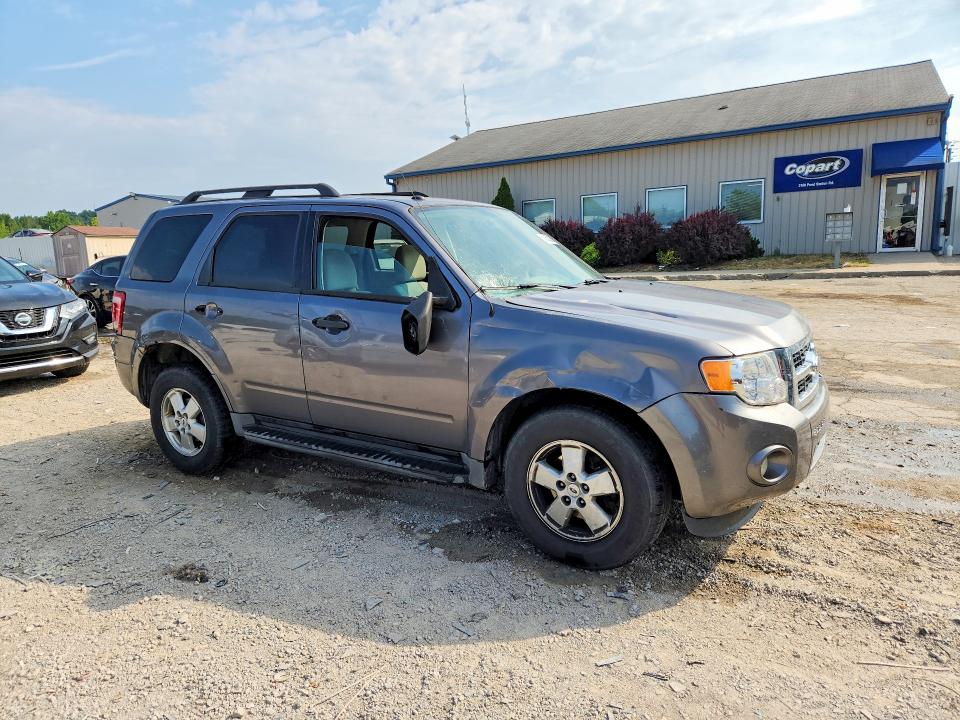 Photo 4 from auction – 2011 FORD ESCAPE with VIN 1FMCU0DG0BKA06022