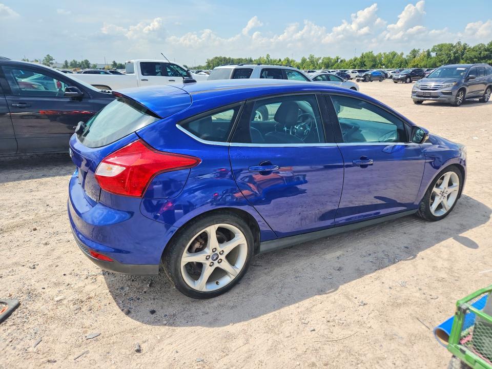 Foto 3 de la subasta – 2012 FORD FOCUS con VIN 1FAHP3N26CL320667