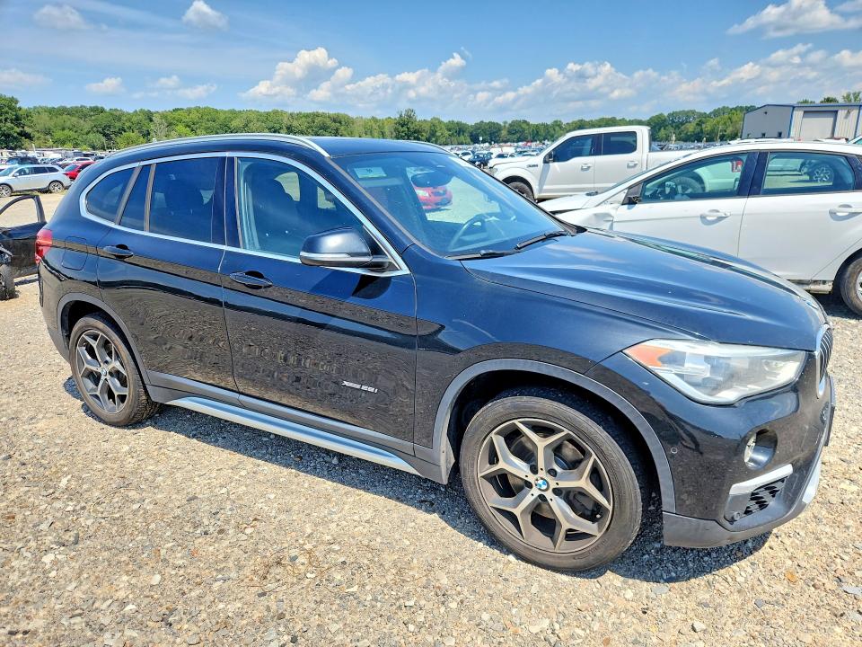Photo 4 from auction – 2017 BMW X1 with VIN WBXHT3Z39H4A65769