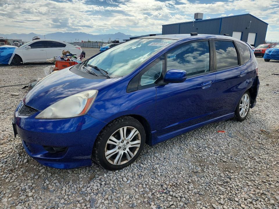 HONDA FIT 2010 with VIN JHMGE8H41AS005301 - Photo from auction
