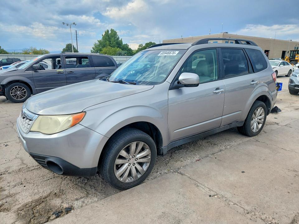 SUBARU FORESTER 2011 with VIN JF2SHBDC3BH730038 - Photo from auction