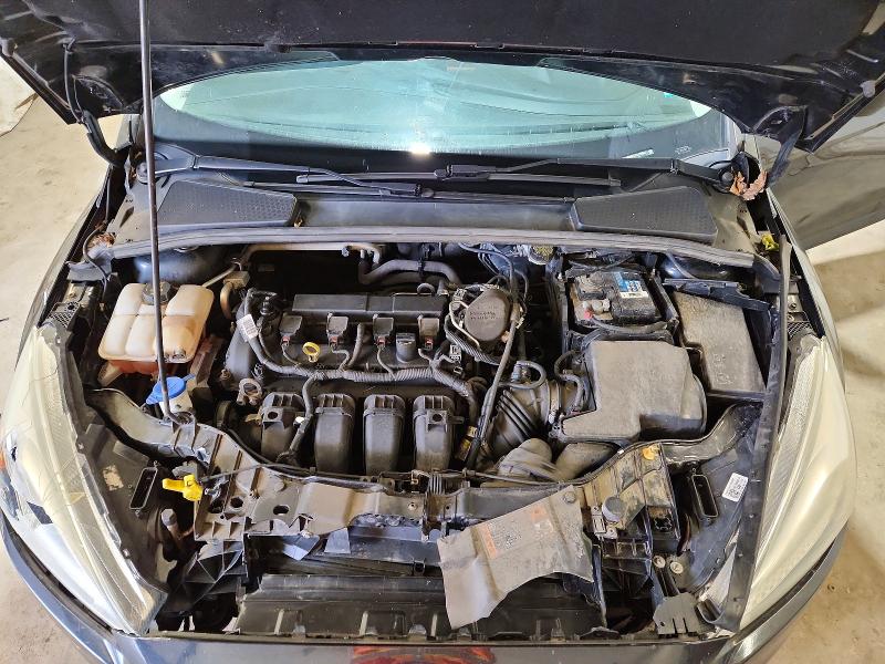 Снимка 11 от търг – 2015 FORD FOCUS с VIN 1FADP3E21FL226537