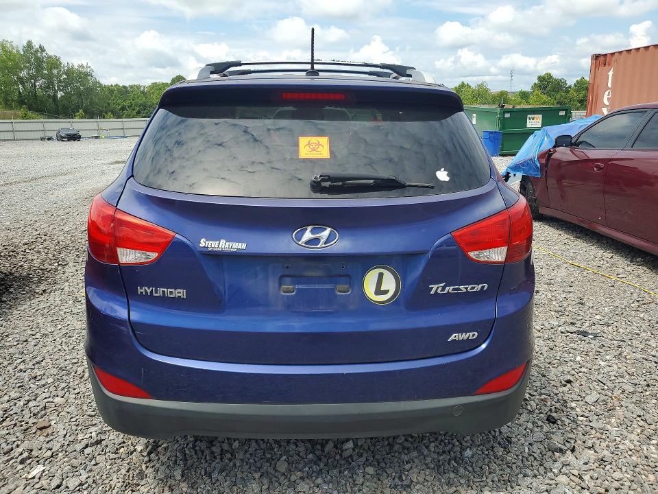 Снимка 6 от търг – 2012 HYUNDAI TUCSON с VIN KM8JUCAC2CU453872