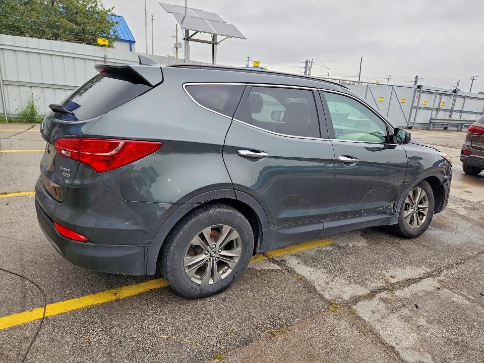 Photo 3 from auction – 2014 HYUNDAI SANTA FE SPORT with VIN 5XYZUDLB7EG174150