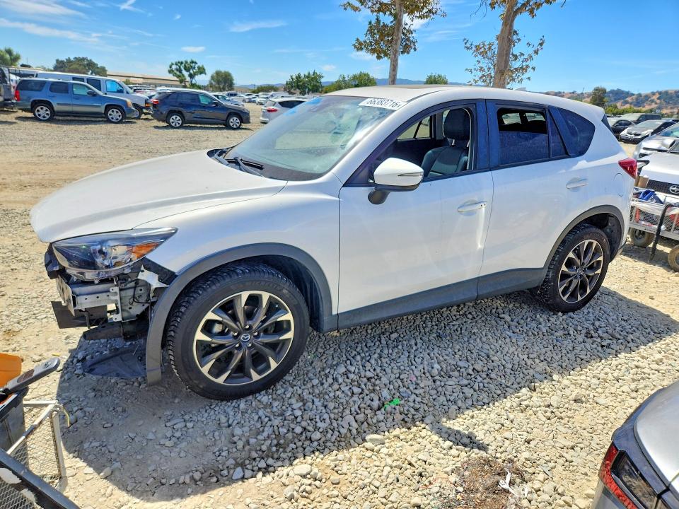 MAZDA CX-5 2016 con VIN JM3KE4DYXG0675941 - Foto de la subasta