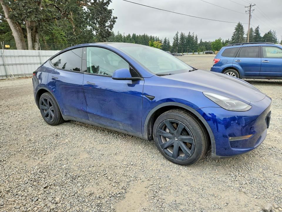 Photo 4 from auction – 2023 TESLA MODEL Y with VIN 7SAYGAEEXPF777194
