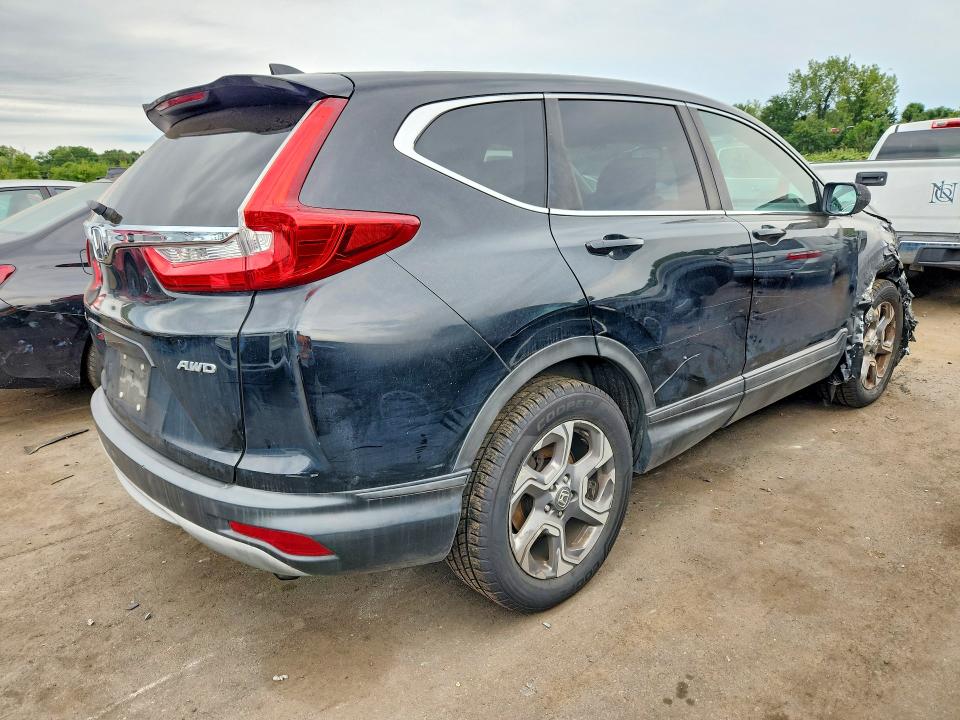 Photo 3 from auction – 2018 HONDA CR-V with VIN 7FARW2H84JE000120