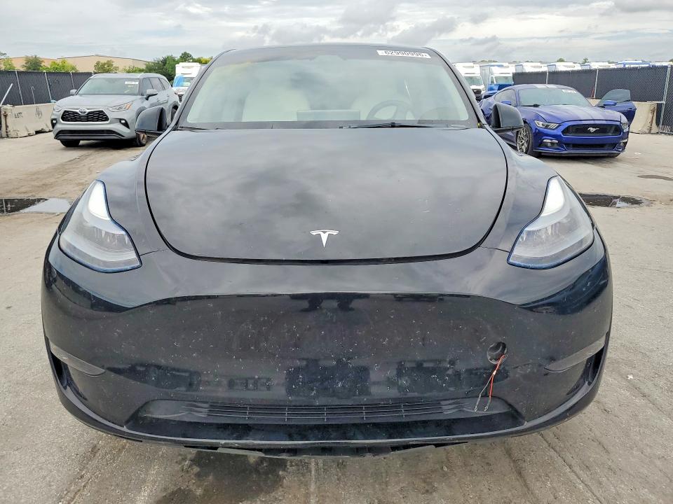 Photo 5 from auction – 2023 TESLA MODEL Y with VIN 7SAYGDEE3PF880944