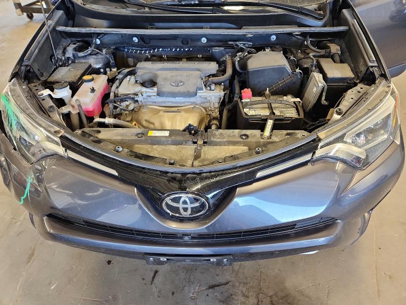 Photo 12 from auction – 2017 TOYOTA RAV4 with VIN 2T3DFREV3HW677026