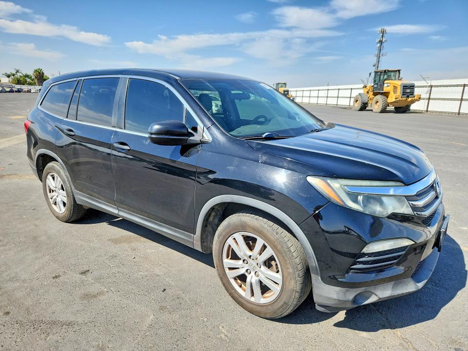 Photo 4 from auction – 2016 HONDA PILOT with VIN 5FNYF5H10GB007392