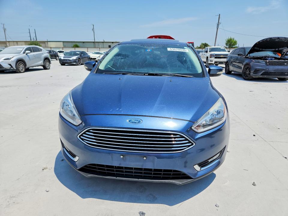 Photo 5 from auction – 2018 FORD FOCUS with VIN 1FADP3J29JL229121
