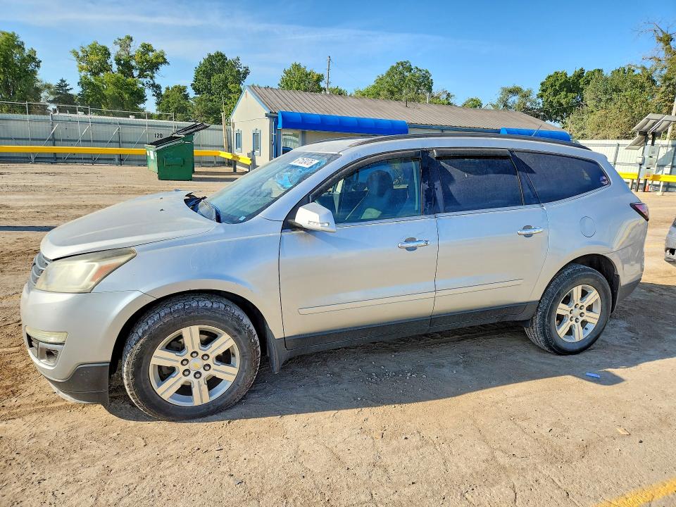 CHEVROLET TRAVERSE 2014 with VIN 1GNKVHKD5EJ375660 - Photo from auction