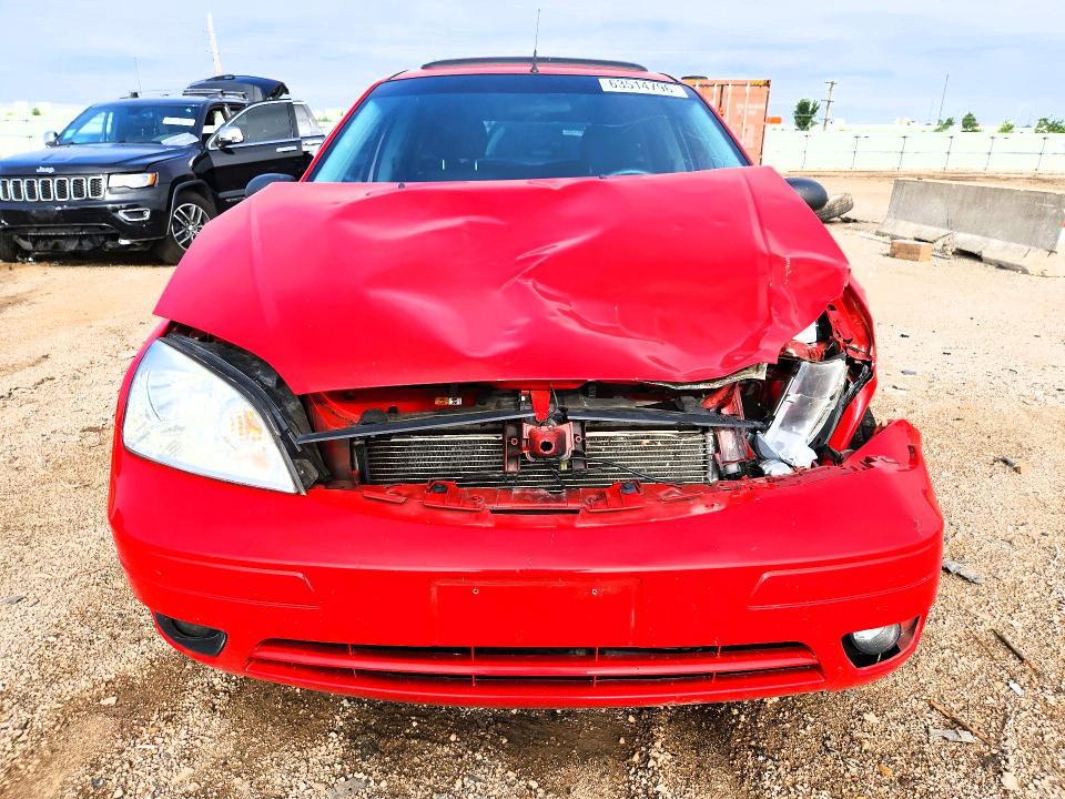 Photo 5 from auction – 2007 FORD FOCUS with VIN 1FAHP37N77W303310