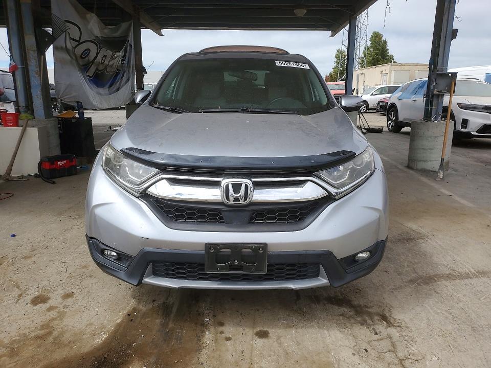 Photo 5 from auction – 2018 HONDA CR-V with VIN 7FARW2H86JE015296