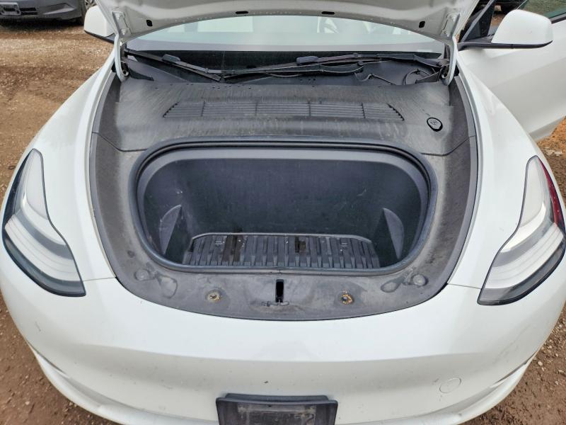 Photo 11 from auction – 2022 TESLA MODEL Y with VIN 7SAYGAEE2NF359547