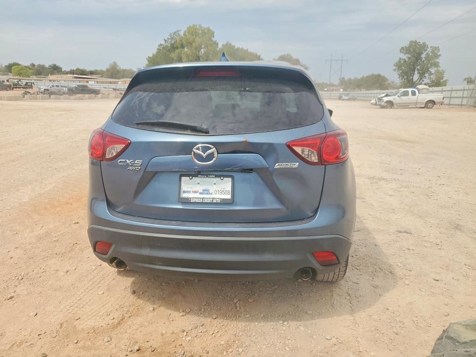 Foto 6 de la subasta – 2016 MAZDA CX-5 con VIN JM3KE4CY6G0885812