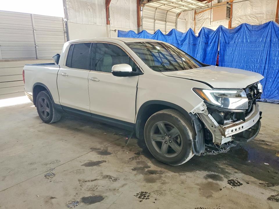 Photo 4 from auction – 2023 HONDA RIDGELINE with VIN 5FPYK3F73PB016960