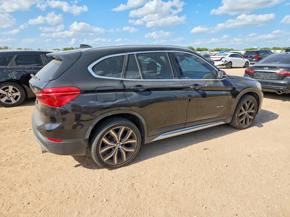 Photo 3 from auction – 2017 BMW X1 with VIN WBXHU7C35H5H34790