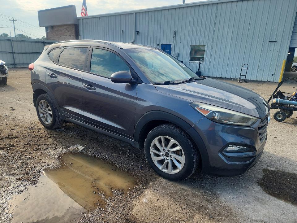 Photo 4 from auction – 2016 HYUNDAI TUCSON with VIN KM8J33A43GU118508
