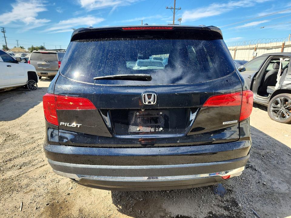 Foto 6 de la subasta – 2016 HONDA PILOT con VIN 5FNYF5H92GB011384