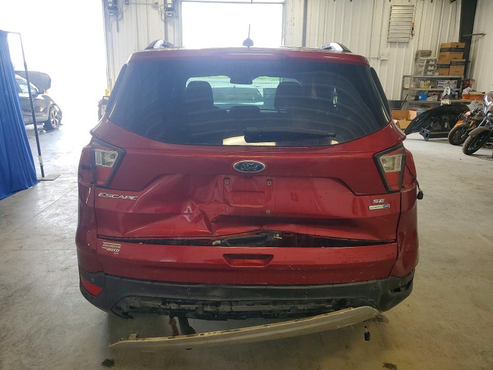 Photo 6 from auction – 2017 FORD ESCAPE with VIN 1FMCU9GD0HUB54559