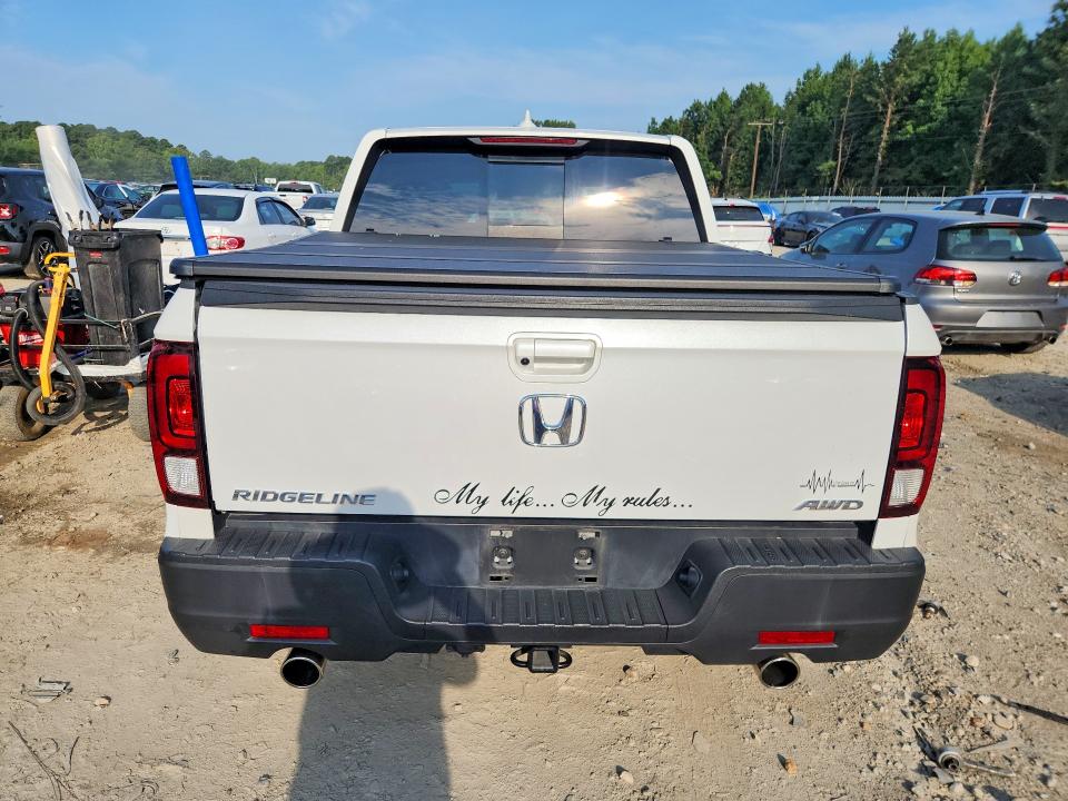 Photo 6 from auction – 2022 HONDA RIDGELINE with VIN 5FPYK3F50NB029578