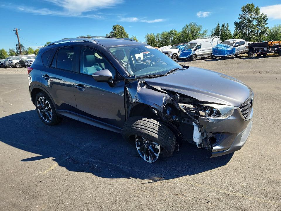 Photo 4 from auction – 2016 MAZDA CX-5 with VIN JM3KE4DY8G0752127