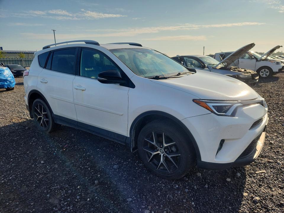 Photo 4 from auction – 2016 TOYOTA RAV4 with VIN 2T3JFREV7GW409596