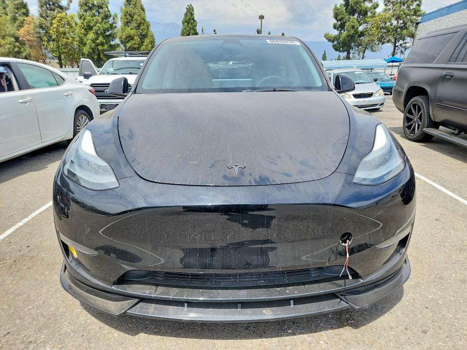 Снимка 5 от търг – 2023 TESLA MODEL Y с VIN 7SAYGDEF2PF659683