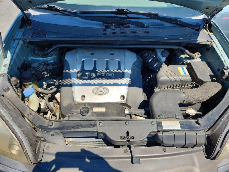 Photo 12 from auction – 2006 HYUNDAI TUCSON with VIN KM8JN72D66U438680