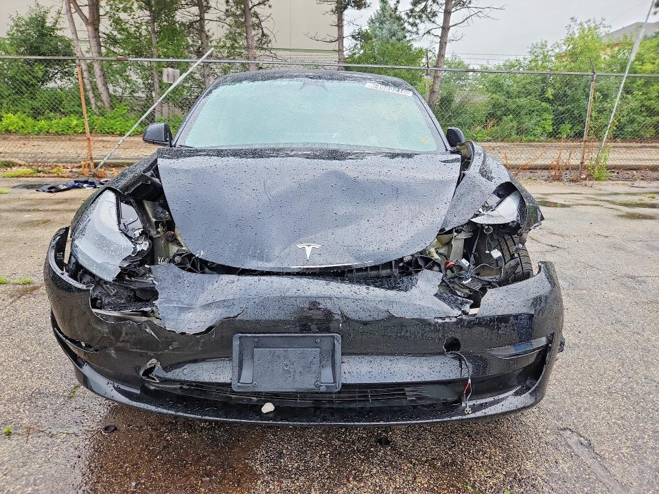 Photo 5 from auction – 2022 TESLA MODEL 3 with VIN 5YJ3E1EA1NF372428