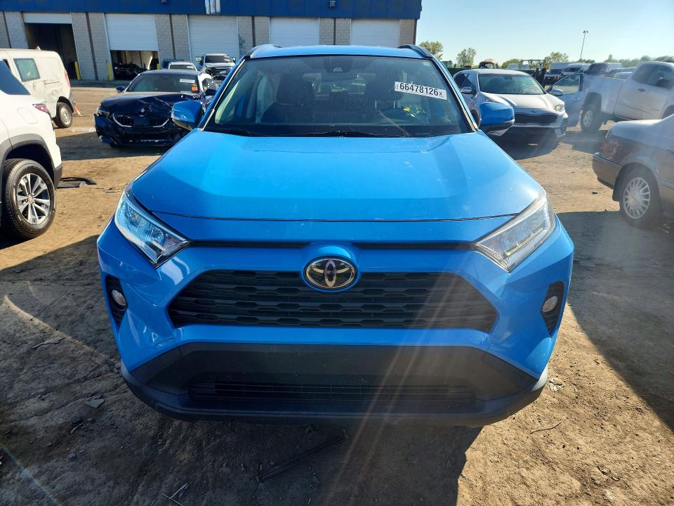 Photo 5 from auction – 2021 TOYOTA RAV4 with VIN JTMW1RFV7MD061245