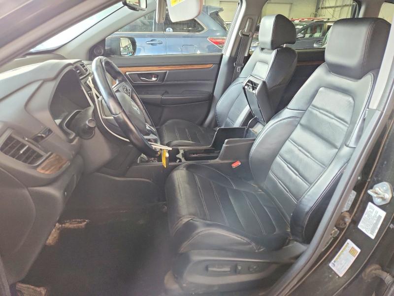 Photo 7 from auction – 2018 HONDA CR-V with VIN 7FARW2H8XJE009842