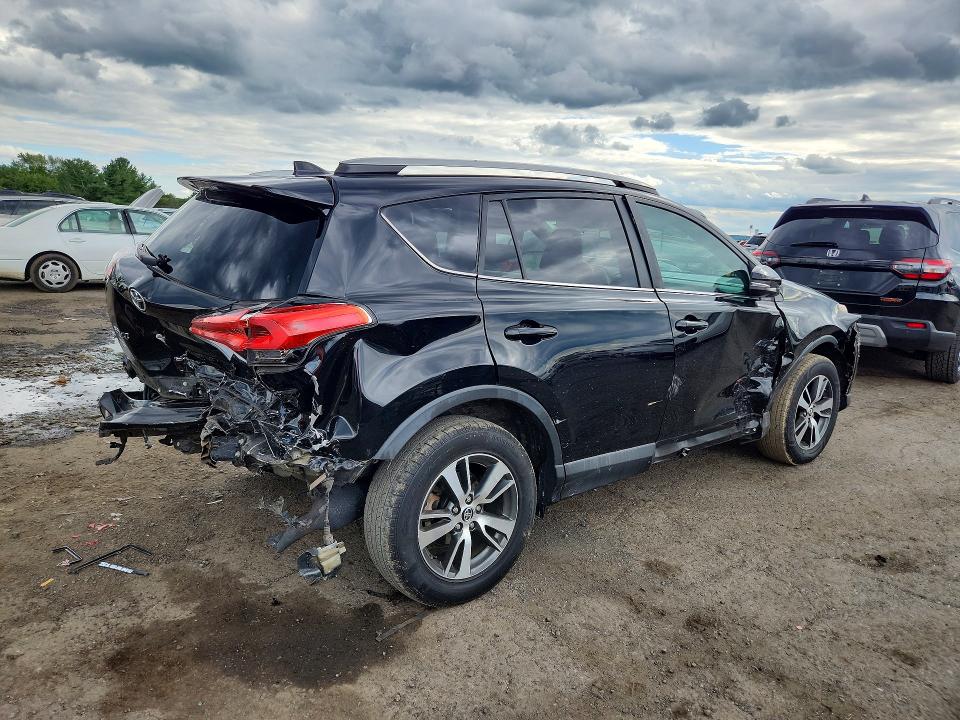 Photo 3 from auction – 2016 TOYOTA RAV4 with VIN 2T3RFREV8GW474055