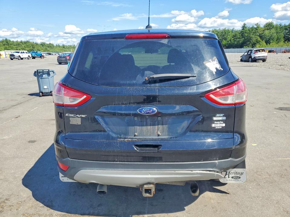 Photo 6 from auction – 2016 FORD ESCAPE with VIN 1FMCU9G98GUB02199